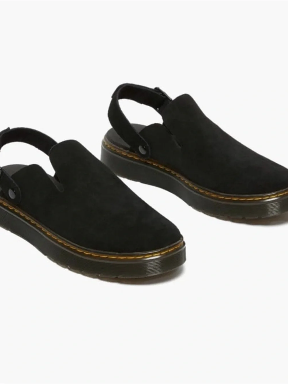 Dr. Martens Carlson slingback mules in black suede, with a chunky buckle